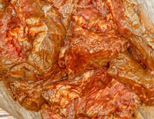 Load image into Gallery viewer, 5lbs MARINATED STEAK TIPS